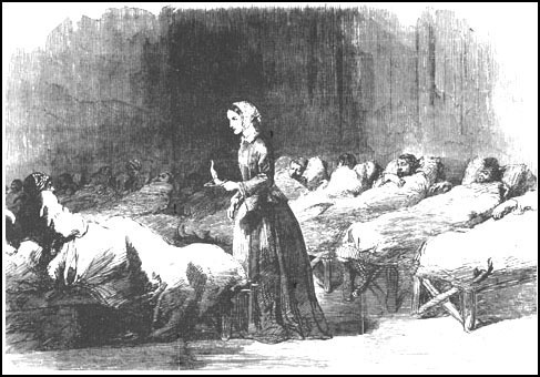drawing of old time nurse in hospital tending to paitents
