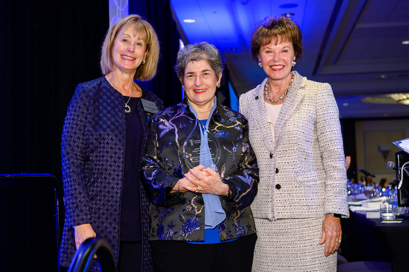 Prof. Sally Cohen holding her award