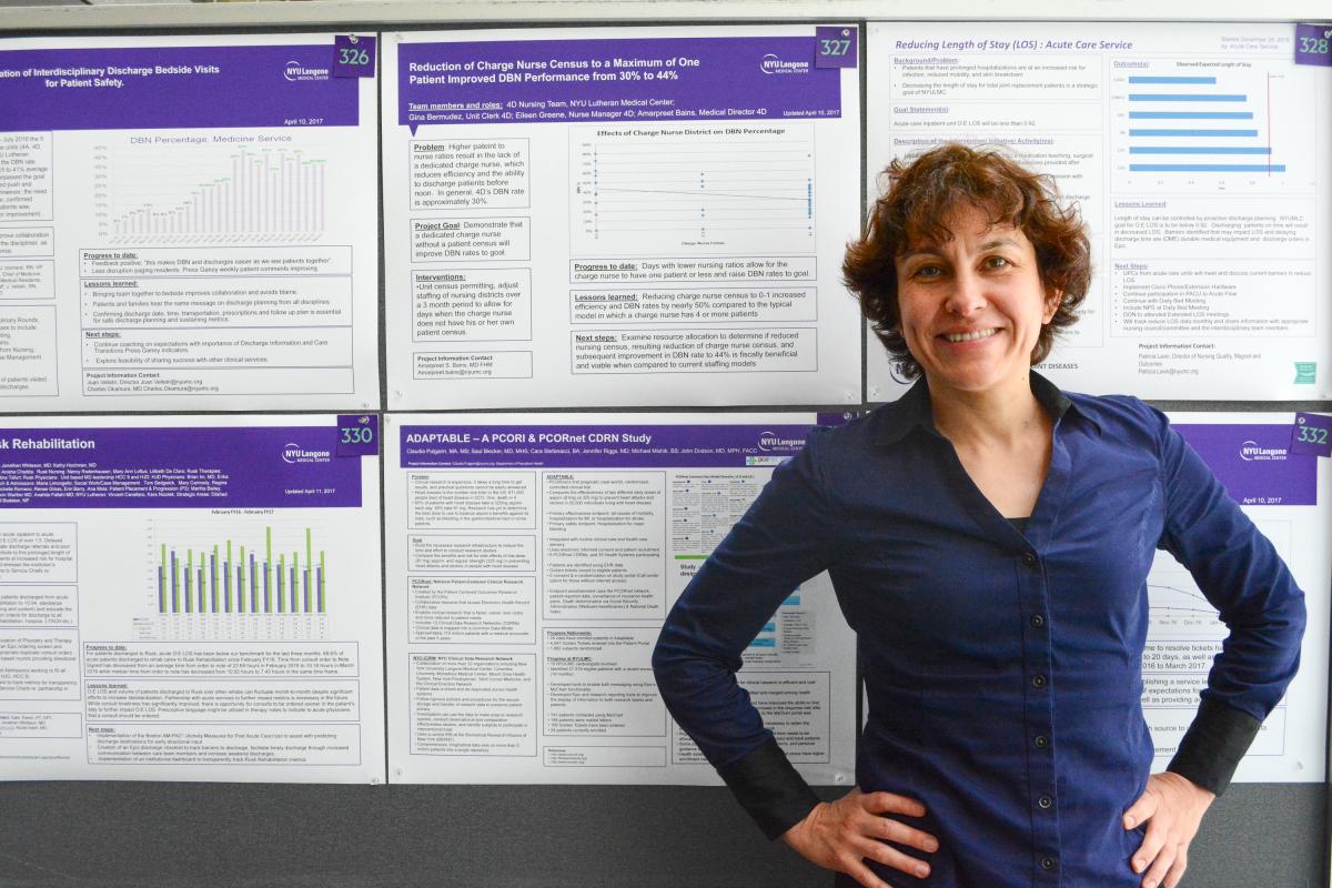 Image of Clauida Pulgarin presenting a poster