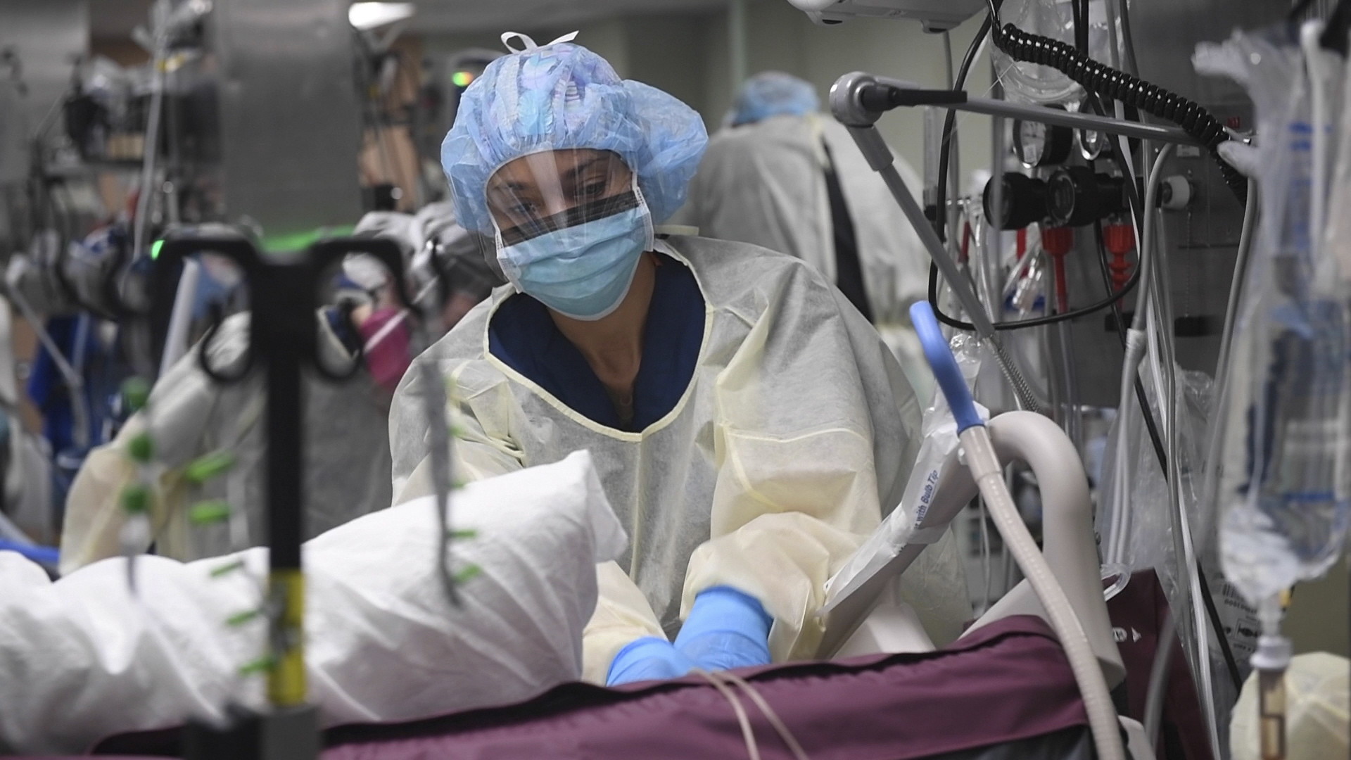 Nurse prepares a patient, aboard the USNS Comfort in New York