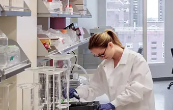 Lab technician testing biospecimens