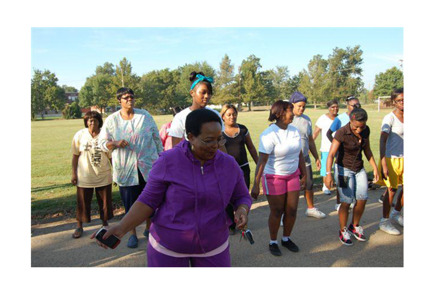 Group of African American women exercising in the park