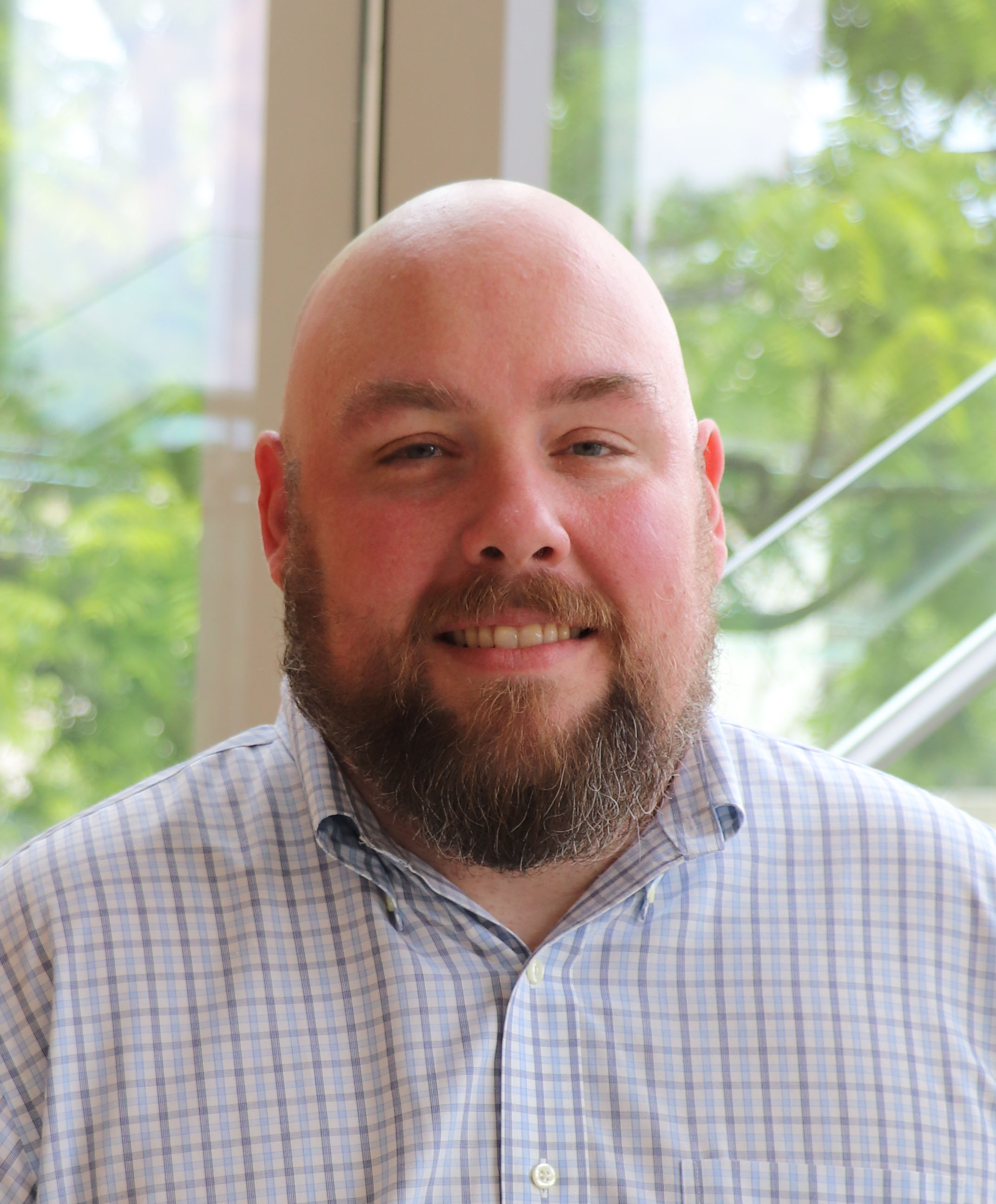 headshot of Clint Owens