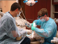 Dentists working on a patient