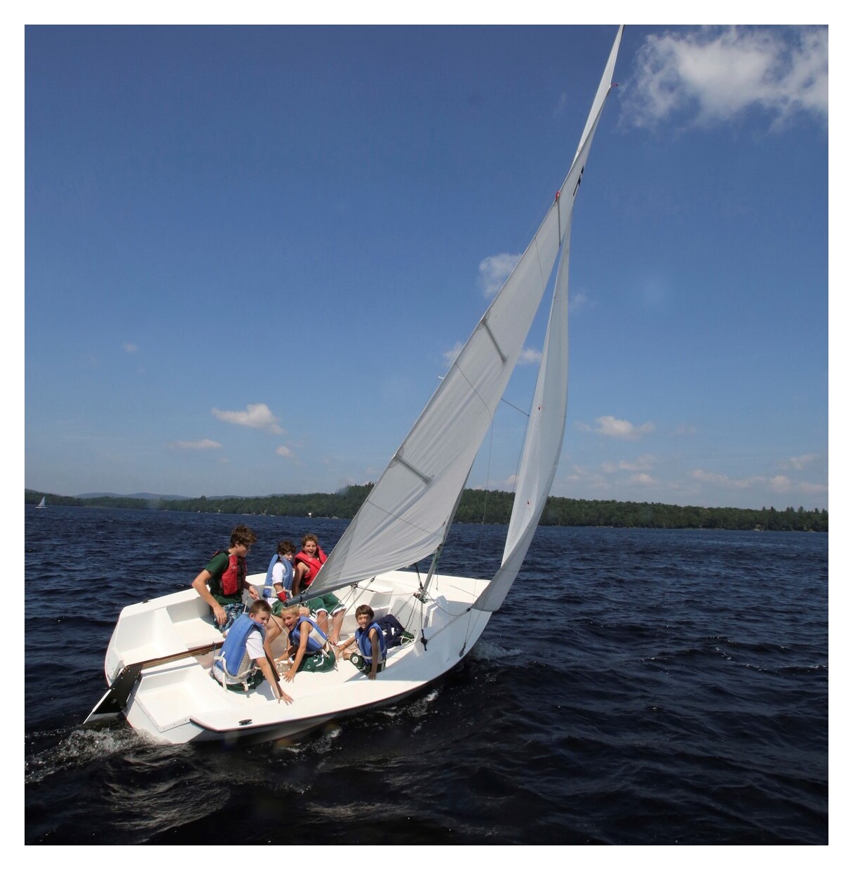 Campers sailing on Raquette Lake