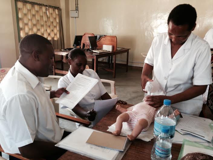 Nurses observe a resuscitation simulation