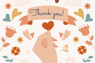 Hand holdinng a heart.  Banner that says Thank you over the top of the hand.  Flowers scattered on the background