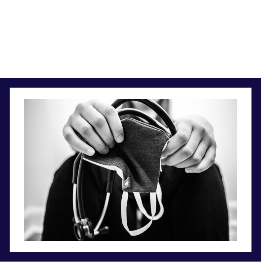 nurse holding mask