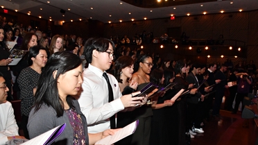 Students reading nursing pledge
